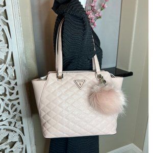 NWT Beautiful Light Pink Guess Purse with charms and a pompom